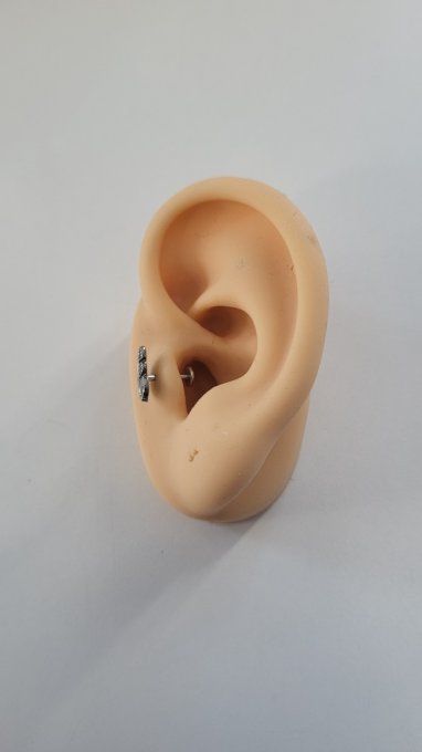 Piercing tragus push in